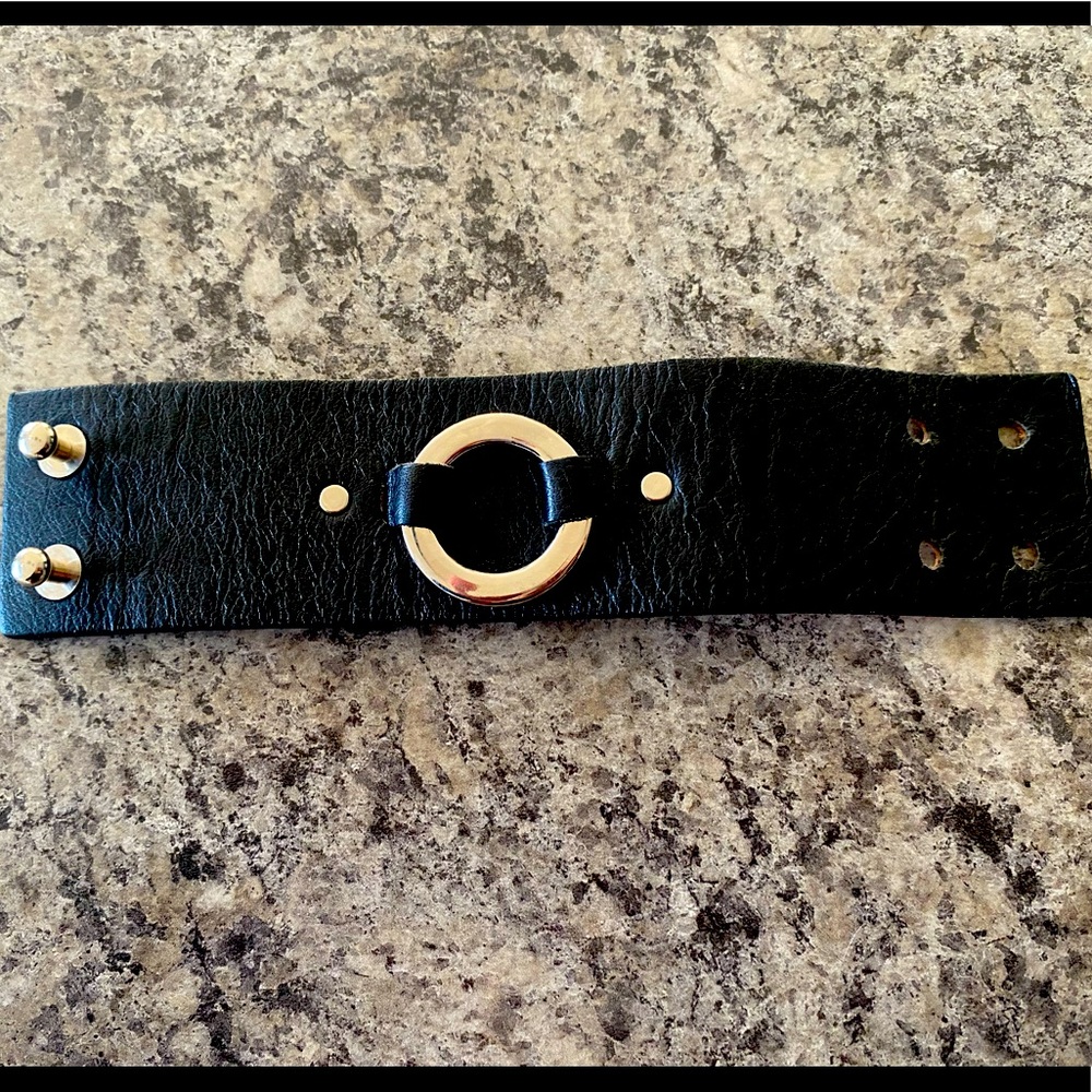 Black leather band bracelet.
